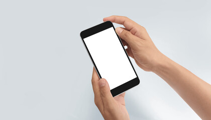 Hand holding smartphone device touching screen