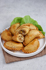 Pastel Goreng is potato empanadas, fried pastry with filling of sautéed vegetable , chicken and boiled egg. The pastry made from sourdough starter discard.