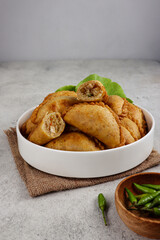 Pastel Goreng is potato empanadas, fried pastry with filling of sautéed vegetable , chicken and boiled egg. The pastry made from sourdough starter discard.