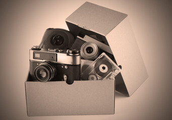 Cardboard box with Antiques trash. Retro effect
