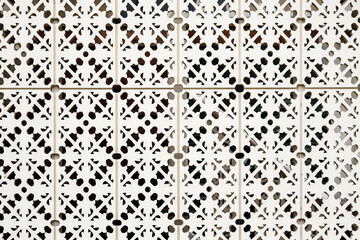 Wood carving with geometric pattern for home interior design elements, screens and room dividers.