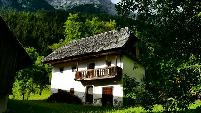 traditional mountain house in slovenia with wooden roof