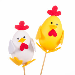 Decorative rooster with wooden stick. Easter decoration.