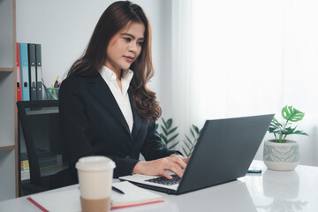 Business women working with laptop in office, business concept
