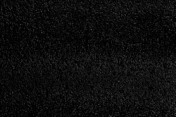 Fototapeta premium Chaotic white bokeh on a black background. light spots texture. abstraction. falling snow. starry sky. bright glare of light texture