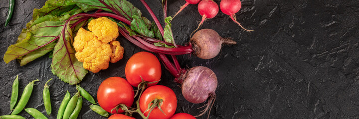 Healthy food panorama on a black background with copy space
