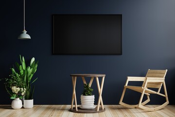 TV on the dark blue wall in the living room has a hanging lamp on the side, decorated with plants and a rocking chair on a beautifully patterned wooden floor.3d rendering.