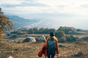 woman hiker travel mountains landscape autumn trees