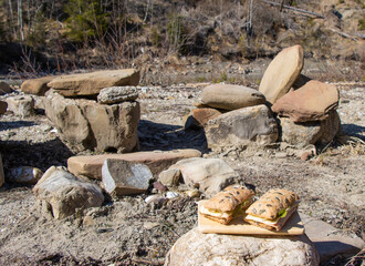 
stone chair and table by the river 