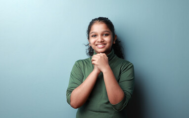 Portrait of a happy young girl with a smiling face