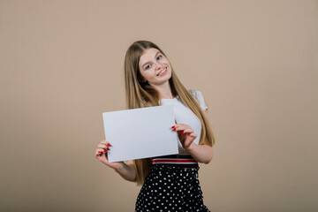 Young beautiful woman hold white banner, isolated portrait.