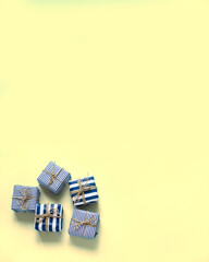 Blue background with boxes in a gift wrap