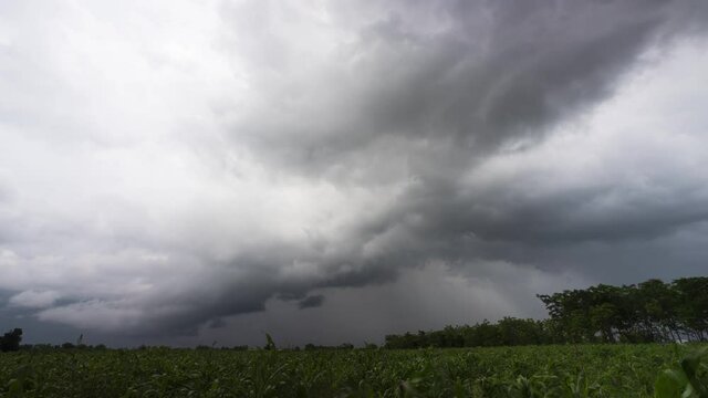 Time Lapse Stormy Clouds Flowing Above Agricultural Field Thailand. Arcus Cloud Background