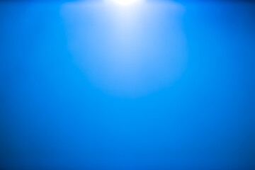 LED black flashlight for background. abstract spotlight on blue screen. picture backdrop for add...