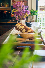 Chocolate swirl brioche wreath on a Wooden  background