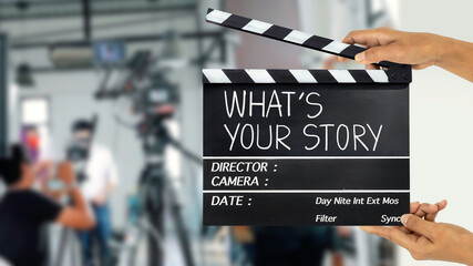 What's your story.text title on film slate and film crew in background