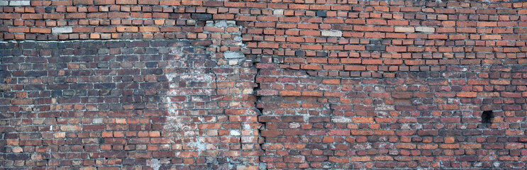 crack in orange bricks old wall