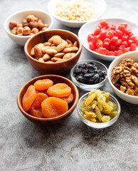 Bowls with various dried fruits and nuts