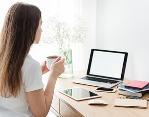 Young girl working at home office