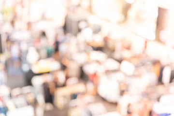 Abstract defocused or blurred background of the shopping mall with nice department store interior. which including of people and shop store.	