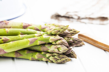 Fresh raw uncooked green asparagus.