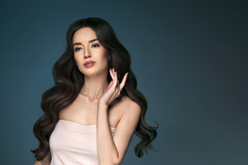 Long hairwoman beautiful face young female  model over dark background