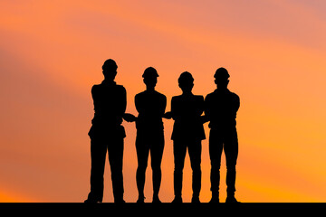 Fototapeta premium Silhouettes of Business people engineer and worker team meeting holding hands together in line, Success Connection and Teamwork Concepts