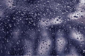 rain drops on a glass in rainy day