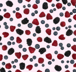 Berries pattern isolated on white. Strawberries, raspberries blackberries and blueberries arranged on white.