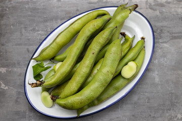 green beans in white dish