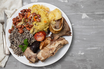 typical portuguese dish meat, smoked sausages and vegetables on the dish