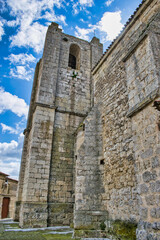 Fototapeta na wymiar Torre campanario iglesia de San Pedro, siglo XVII, en la villa de Montealegre de Campos, provincia de Valladolid, España