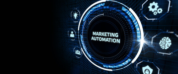 Planning marketing strategy. Business, Technology, Internet and network concept. Young businessman shows the word: Marketing automation