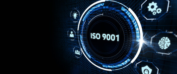 The concept of business, technology, the Internet and the network. A young entrepreneur working on a virtual screen of the future and sees the inscription: ISO 9001