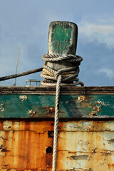 rope around boat mooring cock