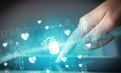 Close-up of a touchscreen with healthcare icons