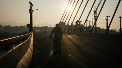 bike at bridge at sunrise