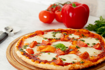 Freshly baked pizza on table close up