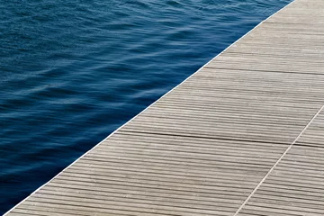Fotobehang Empty wooden dock © SKfoto