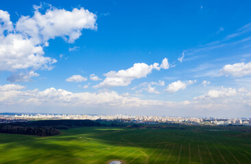 Aerial view of agricultural landscape with fields in spring season.