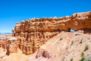 Fototapeta premium A natural rock formation of Red Rocks Hoodoos in Bryce Canyon National Park, Utah