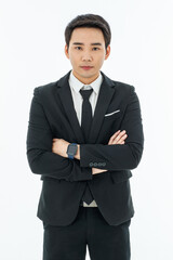 Business man in black suit cross arm with yes concentrate to camera standing by white background. Looks smartstyle. Successful entrepreneur.