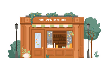 Souvenir shop facade exterior isolated small retail business building flat cartoon. Vector antique store, collectables in shop window, presents, gifts, decorative vases. Green trees, street lamps