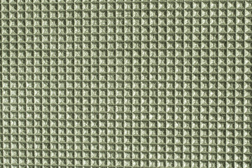 Background texture with pattern of small squares with relief. Gold.Silver.Green