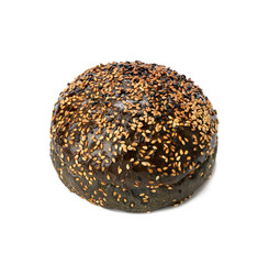 black baked bun with sesame seeds isolated on white background