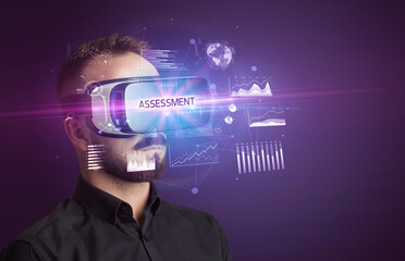 Businessman looking through Virtual Reality glasses