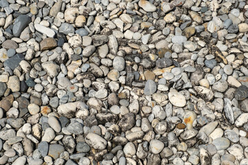 Topview of abstract stone pebbles background texture for background or backdrop.