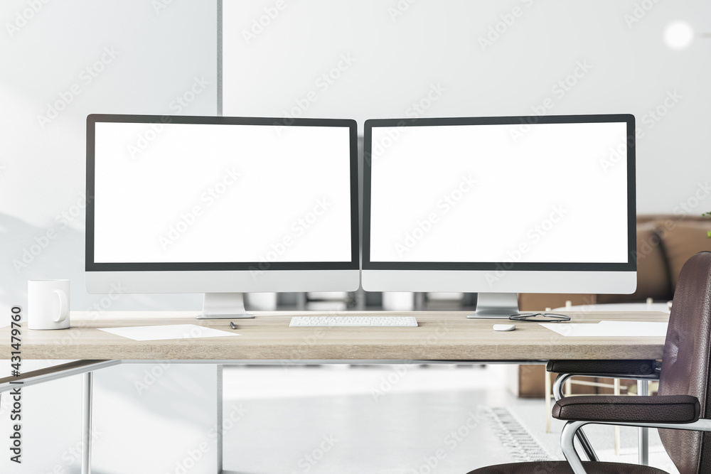 Poster blank white computer monitors on light wooden table with keyboard and brown leather chair near. 3d r