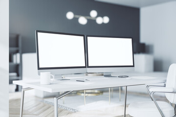 White computer monitors with copyspace for your logo on work light wooden table in sunny modern interior design room on blurry home furniture background. 3D rendering, mock up