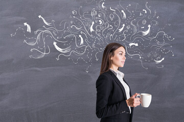 Making decision concept with satisfied businesswoman with coffee mug on light arrows on blackboard background. © Who is Danny